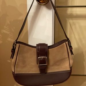 Coach legacy suede exterior shoulder purse.